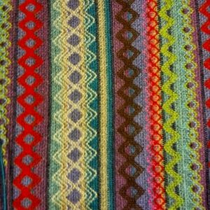 Multi colored vest with faux fur